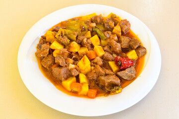 Sauteed chicken with carrots and peas ( Turkish ; Et, Tavuk Sote, guvec  )