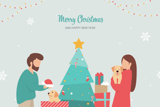 Merry Christmas and Happy New Year card. Couple couple celebrating Christmas at home with cute Labrador Retriever puppies.