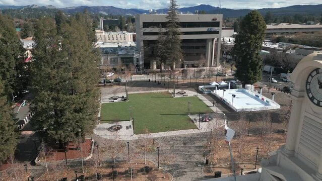 Aerial View Of Courthouse Square In Santa Rosa CA Flying Backwards Past Clock