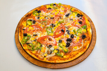 Delicious mixed pizza with rich content. Menu concept of choice and diversity. Karisik pizza