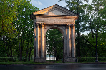 Fototapeta na wymiar View of the Admiralty Gate of Gatchinsky Park on a summer morning, Gatchina, Leningrad region, Russia