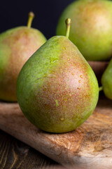 Whole ripe green pears, close up