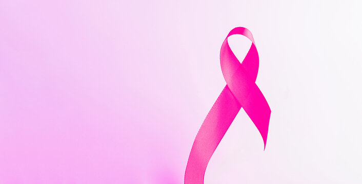 Cancer ribbon. Health care symbol pink ribbon on white background. Breast cancer woman support concept. World cancer day.