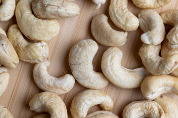 Fresh peeled cashew nuts on the table