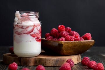 Fresh delicious milk yogurt with raspberry flavor