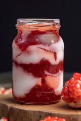 Fresh delicious milk yogurt with pomegranate flavor