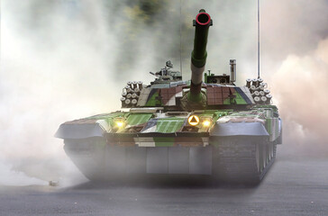 Army battle tank at war under smokey ground