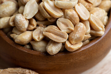 Peeled and roasted peanuts on the table
