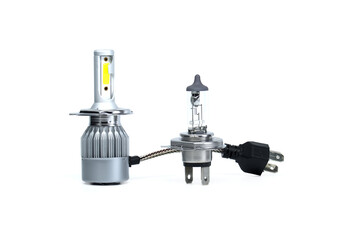 H4 halogen lamp and LED headlight bulb on white