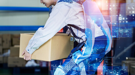 A worker wearing a power assist suit and carrying a load and technology concept.