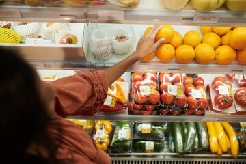 Woman Buying Fresh Fruits