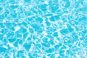 Light blue water ripple in swimming pool abstract and white seamless patterns background