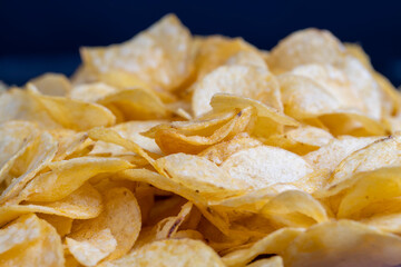 scattered potato chips with natural spices