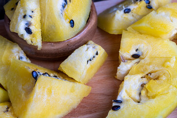 Ripe and juicy yellow watermelon cut into pieces