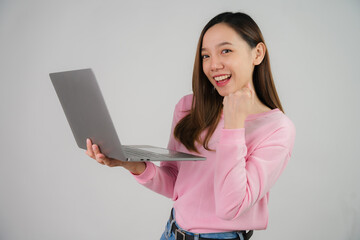 Asian girl holding laptop on white background