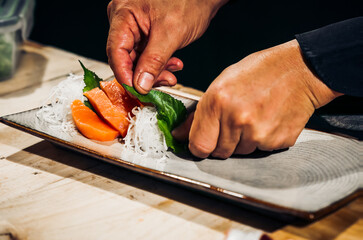 Sashimi Japanese food, Sashimi set. Salmon, wasabi, fish, shrimp,octopus, sashimi, hirame, salmon sashimi and tuna sashimi, Japanese food concept, with copy space. Dark Tone