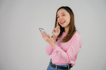 Asian girl holding laptop on white background