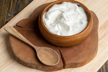 Yogurt made from cream with the addition of chocolate pieces and crumbs
