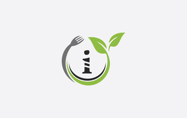 Green leaf food logo with spoon and healthy logo design image spoon fork and leaf