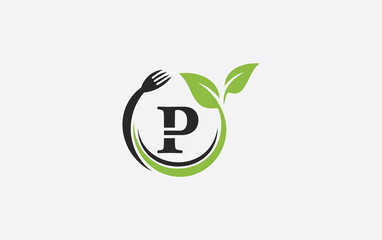 Green leaf food logo with spoon and healthy logo design image spoon fork and leaf