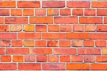 pattern of old house wall with red bricks