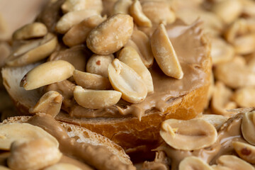 Peanut paste on a soft wheat baguette