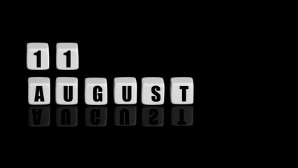 August 11th. Day 11 of month, Calendar date. White cubes with text on black background with reflection. Summer month, day of year concept