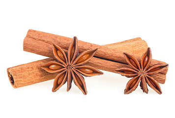 Star anise spice and aromatic cinnamon sticks and isolated on a white background