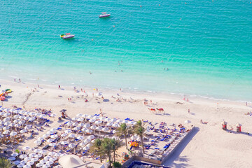 background photo top view of the beach, sea and vacationers, from a great height in Dubai Jumeirah Beach, Dubai, UAE

