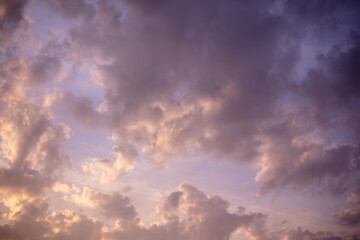 Colorful clouds at sunset as background.