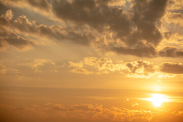 Colorful clouds at sunset as background.