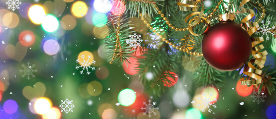 Obraz na płótnie Canvas Christmas ball and decor on fir tree against blurred lights, closeup