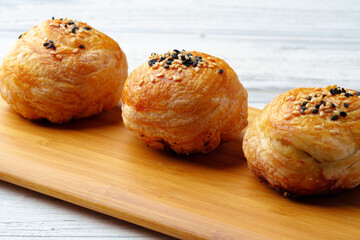 Homemade turkish piesl pogaca with sesame seeds