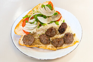 Meatball between bread (Turkish name : ekmek arasi kofte ) Izgara kofte. Manisa, Akcaabat, Akhisar  kofte