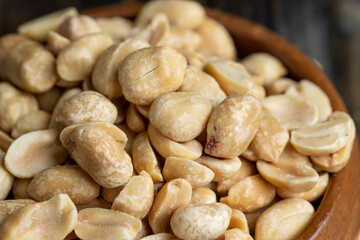 Peeled and roasted peanuts on the table