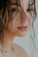 Sensual beautiful woman with wet hair after shower