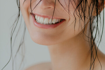 Smiling happy young beautiful woman closeup. Skin and teeth care