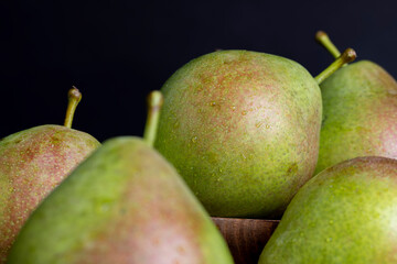 Whole ripe green pears, close up