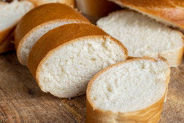 Sliced wheat loaf on the table