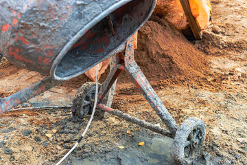 Industrial concrete mixer at a construction site. Mixing concrete and mortar on site. Construction...