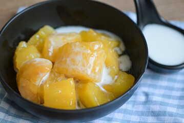 cassava food on the table food, sweet dessert made of boiled cassava, sugar and coconut milik - Thai food