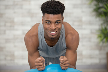 young man training at home