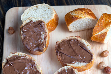 chocolate butter spread on a baguette, close up