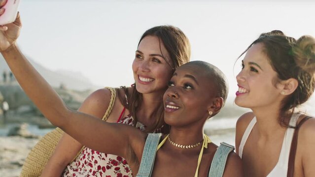 Women friends, beach selfie and summer vacation with smartphone tech for social media, bonding or diversity. Woman group, phone and digital photo together by ocean, happy and sunshine in Cape Town
