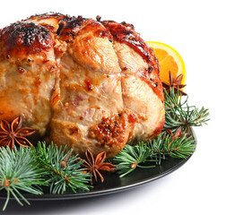 Plate with tasty Christmas ham, fir branches, lemon and anise on white background, closeup