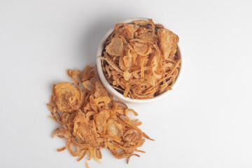 Crispy fried onion slices on a white background