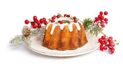 Plate with tasty Christmas cake and decor on white background