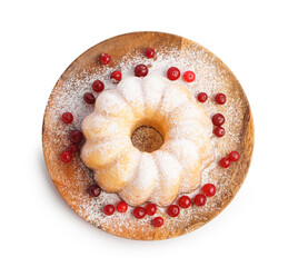 Wooden plate with tasty Christmas cake and cranberry on white background