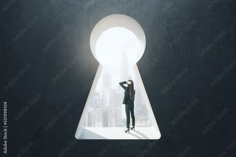Poster abstract image of thinking businesswoman standing in keyhole opening and looking into the distance o