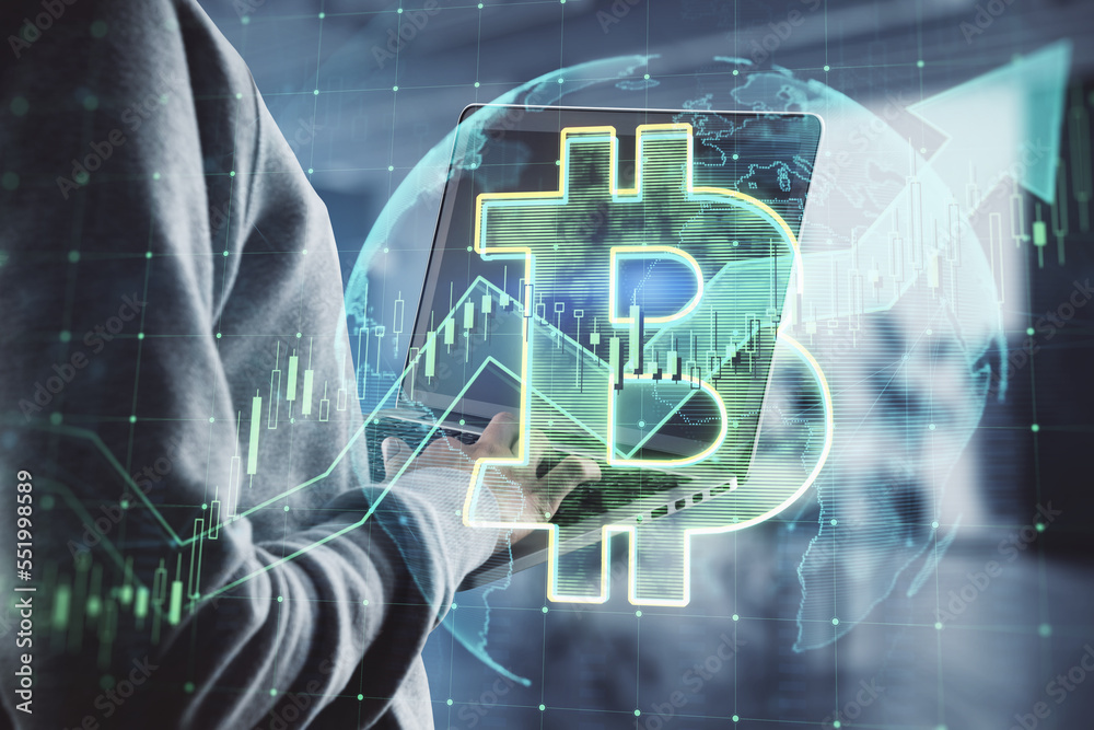 Aufkleber close up of hand using laptop with growing global bitcoin hologram on blurry background. cryptocurre